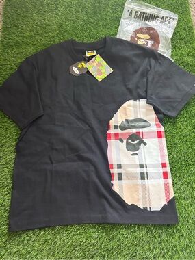 A Bathing Ape Black Short Sleeve Tee with Plaid Ape Head Graphic